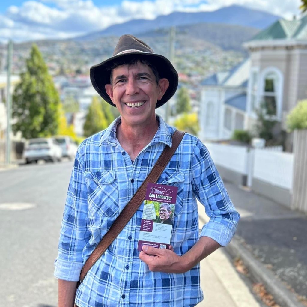 Ben standing in front of kunanyi/Mt Wellington